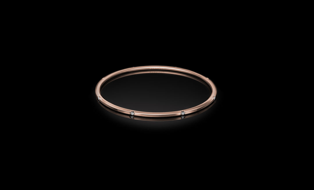 Halo No.7 bangle rose gold rotated 1920x1160