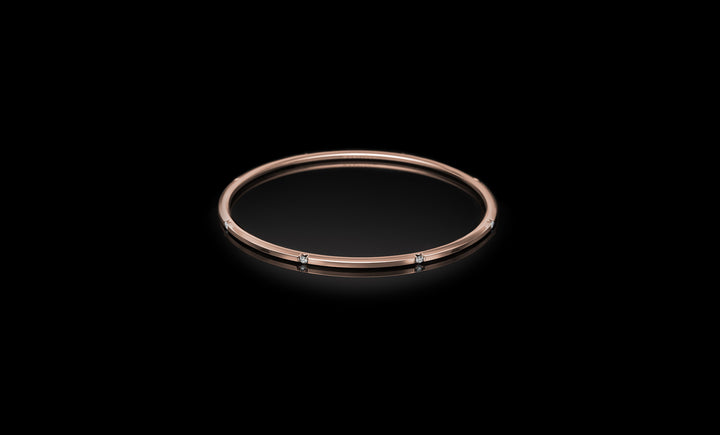 Halo No.7 bangle rose gold rotated 1920x1160